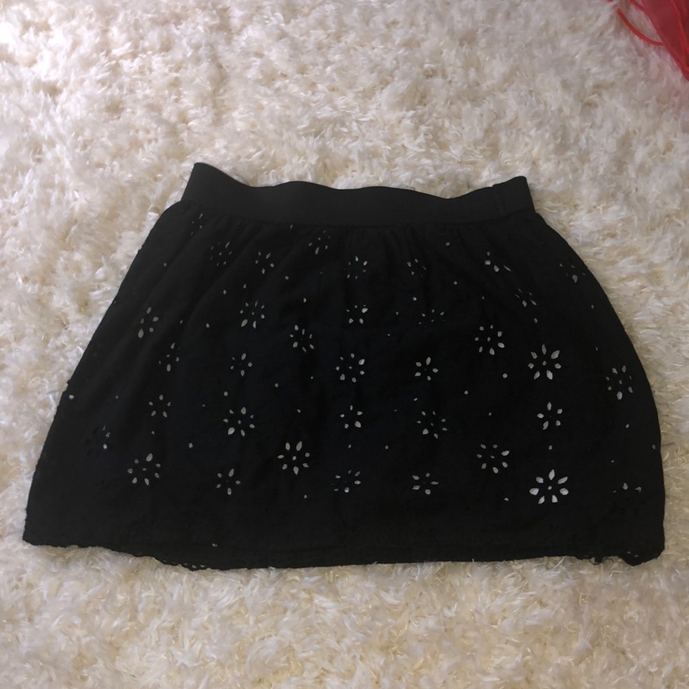 black skirt with flower design